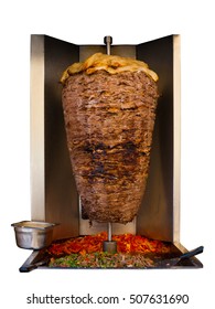 Grilled skewered lamb mutton, a traditional meat served in shawarma or kebab sandwich in the Mediterranean, Arab countries in Middle East cooking on spit in machine isolated on white background
