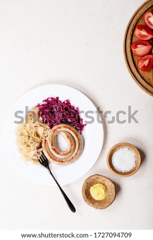 Similar – Foto Bild Food background with raw white radish with greens on light kitchen table with cutting board and knife, top view