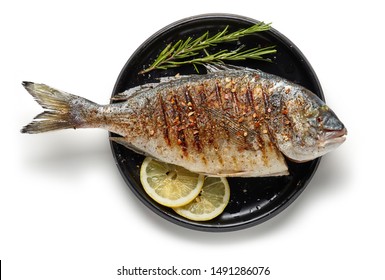 Grilled Spicy Fish On Black Plate Isolated On White Background, Top View