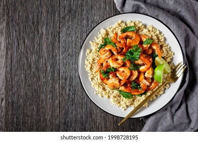 Grilled Spicy Prawns Served With Sliced Avocado And Crunchy Quinoa Kale Salad On A Plate With Cutlery, Horizontal View From Above, Flat Lay, Free Space