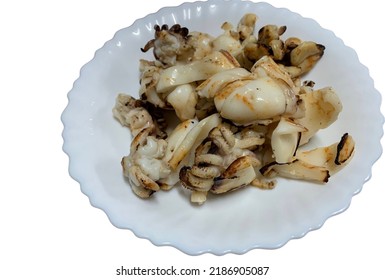 Grilled Squid Cut Into Small Pieces In A White Plate ,isolated On A White Background.no Focus