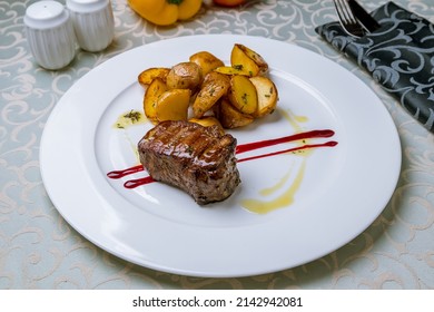 Grilled Steak Filet Mignon On White Plate