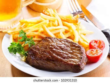 Grilled Steak With French Fries