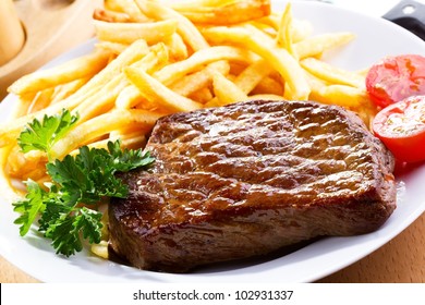 Grilled Steak With French Fries