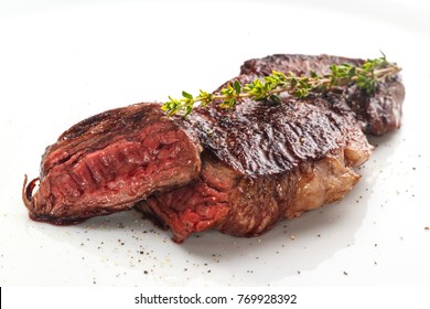 Grilled Steak On White Plate