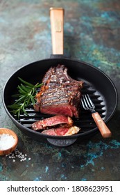 Grilled Steak Rib Eye On Cast Iron Pan, Selective Focus