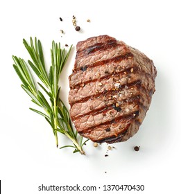 Grilled Steak And Rosemary Isolated On White Background, Top View