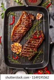 Grilled  Striploin Steak With Spices And Herbs On Grill Iron Pan.The Strip Steak, Also Called A New York Strip.