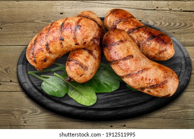 Grilled Tasty Bratwurst Sausages On The Plate