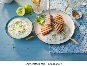 Grilled Tuna Filet On Skewers With Spiced Cream Cheese And Lime