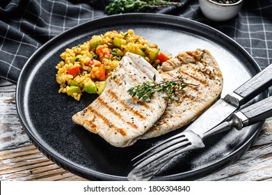 Grilled Turkey Breast Steaks With Quinoa Salad. White Background. Top View