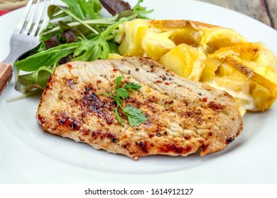 Grilled Turkey Cutlet And Potato Gratin