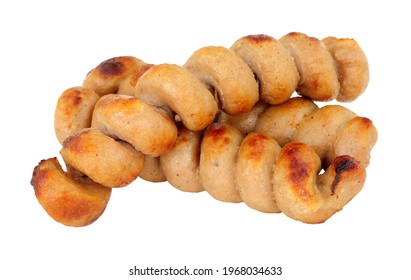 Grilled turkey twizzlers, turkey meat formed into spirals isolated on a white background