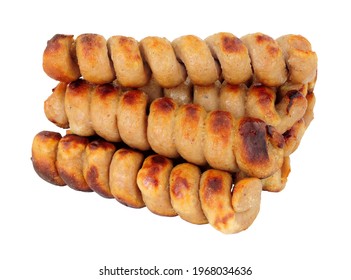 Grilled turkey twizzlers, turkey meat formed into spirals isolated on a white background