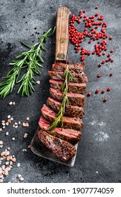 Grilled Vegas Strip Steak. Marble Meat Beef. Black Background. Top View