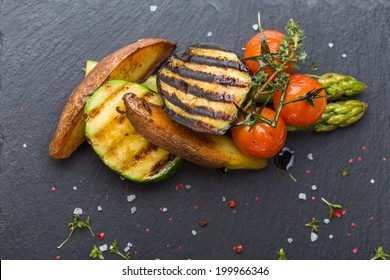 Grilled Vegetables On Black Background