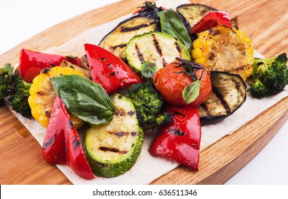 Grilled Vegetables On Cutting Board Isolated On White Background