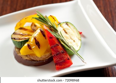 Grilled Vegetables On A White Plate