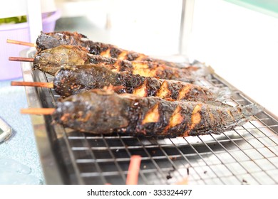 Grilled Walking Catfish. Grilled Fish. Their Sauce Made From Curcumin To Give Yellow-orange Color In Fish.