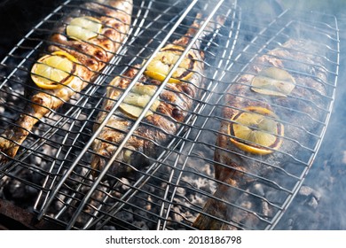 Grilling Dorada Fish On Grill. Food Photography