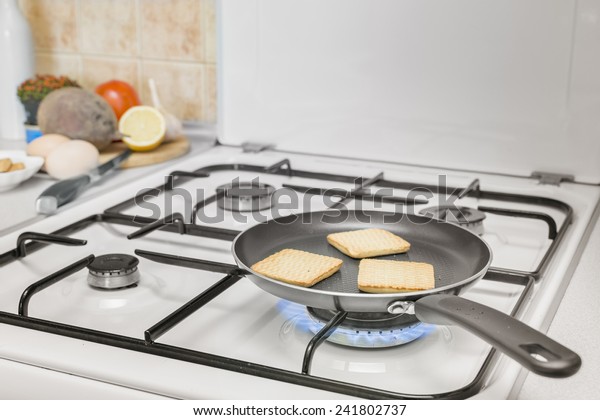 Grilling Pan Toast Burning Flame Gas People Food And Drink