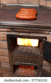 Grilling Sausages On Wood Burning Stove