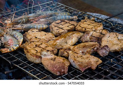 Grilling Steak And Shrimp