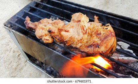 grilling thin pork chops on flame