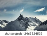 Grim mountain peak in French Alps background