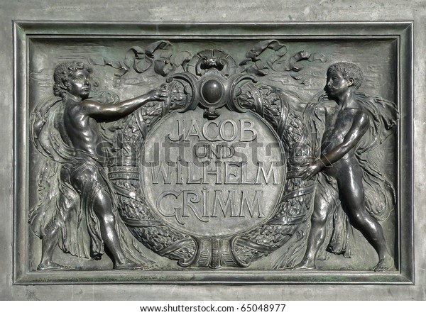 Grimm Brothers - inscription of the famous literary monument in Hanau city, Germany, sculpted by Syrius Eberle