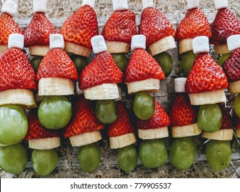 Grinch With Santa Hat Fruit Treats