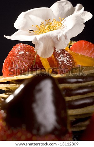 Similar – Image, Stock Photo Assorted gourmet pastries with fresh fruit toppings