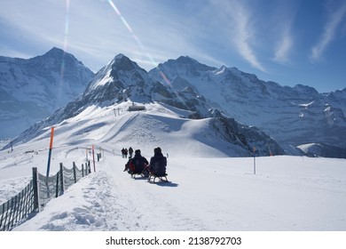 Grindelwald, Switzerland, March 6, 2022 - Lugers on the slopes of the Swiss Alps