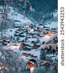 Grindelwald, under the soft glow of the night lights, transforms into a magical village where the snow glistens and each chalet seems to watch over the peaceful, slumbering mountains.