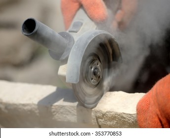 Grinder Worker Cuts A Stone The Electric Tool