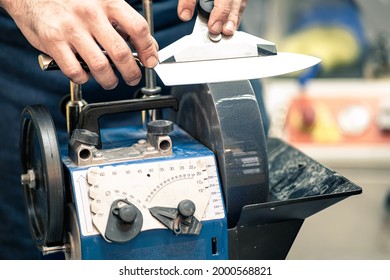 Grindstone close-up. Electric knife sharpening machine - Powered by Shutterstock