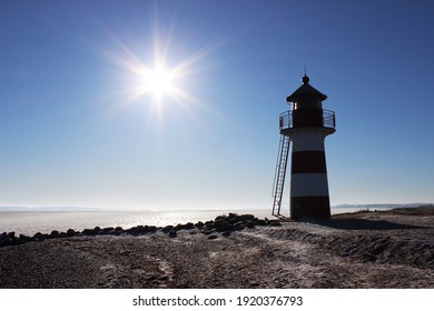 Grisetaodde lighthouse on Oddesund shore, Denmark