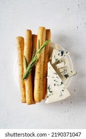 Grissini With Blue Cheese, Bread Stick, Italian Traditional Cuisine Close Up On White Background, Top View