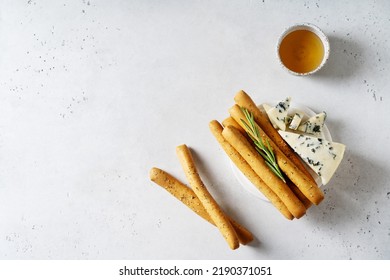 Grissini With Blue Cheese, Bread Stick, Italian Traditional Cuisine Close Up On White Background, Top View