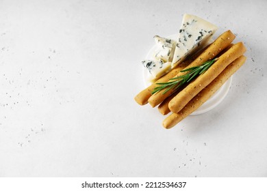 Grissini With Blue Cheese, Bread Stick, Italian Traditional Cuisine Close Up On White Background, Top View