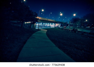 Gritty Dark Chicago Highway Bridge Underpass With Traffic At Night.