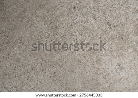 Gritty Exposed Aggregate Concrete Surface Texture for Architectural Background or Pavement