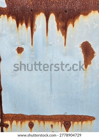 Gritty Metal Surface with Vertical Rust Drip Stains and Oxidation

A visually striking metal background featuring long vertical rust drips and heavy oxidation at the top. This 