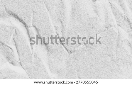 Gritty white marble texture with deep charcoal veins and crumpled stone details for a professional, minimalist industrial background.