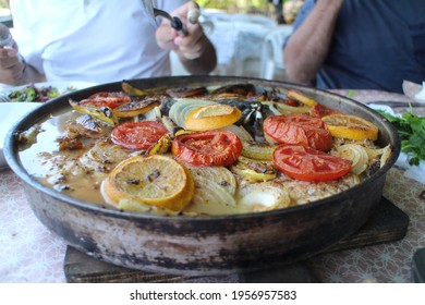 Grizzly Fish Cooked In Stone Oven