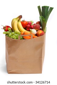 A Grocery Bag Full Of Healthy Fruits And Vegetables