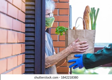 Grocery Delivery To Senior Woman During Pandemic