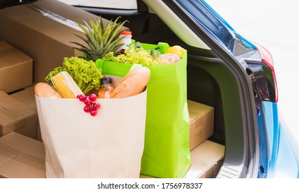 Grocery Service Giving Fresh Vegetables And Fruits And Food In Green Cloth Bag And Wooden Basket On The Back Car Ready Delivery To Send Woman Customer