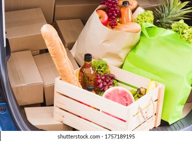 Grocery Service Giving Fresh Vegetables And Fruits And Food In Green Cloth Bag And Wooden Basket On The Back Car Ready Delivery To Send Woman Customer