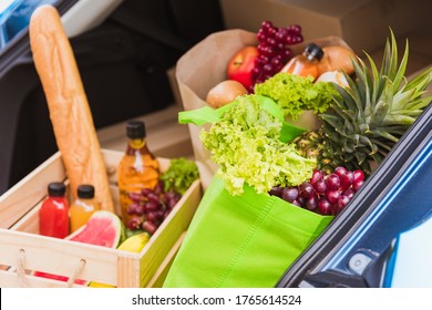 Grocery Service Giving Fresh Vegetables And Fruits And Food In Green Cloth Bag And Wooden Basket On The Back Car Ready Delivery To Send Woman Customer